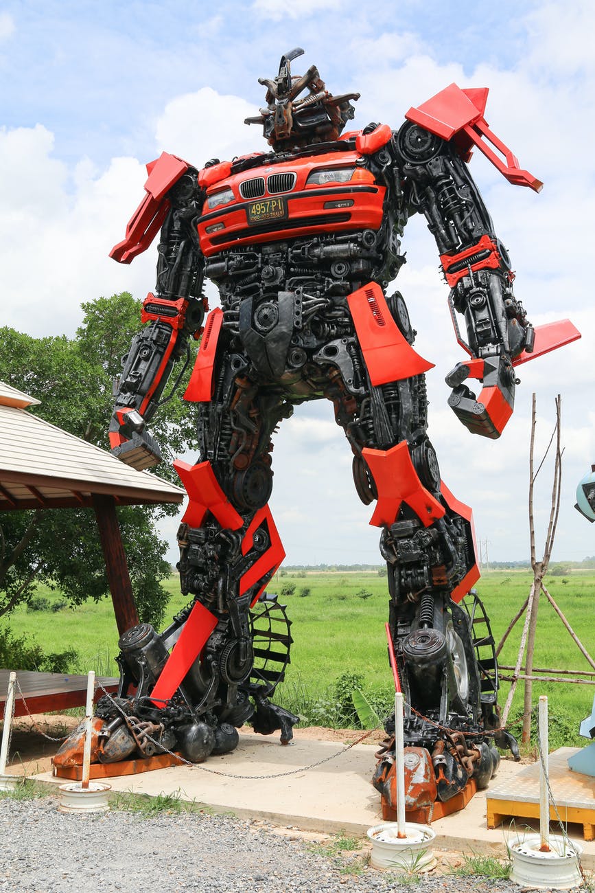red and black robot statue